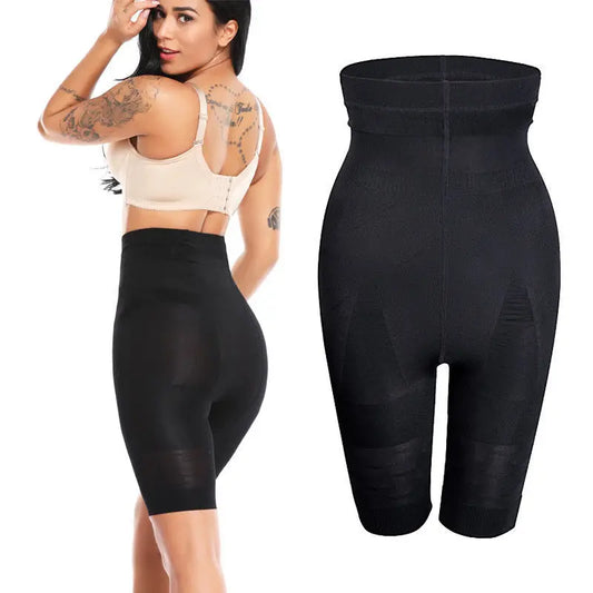 Black shapewear shorts with a model wearing them on a white background