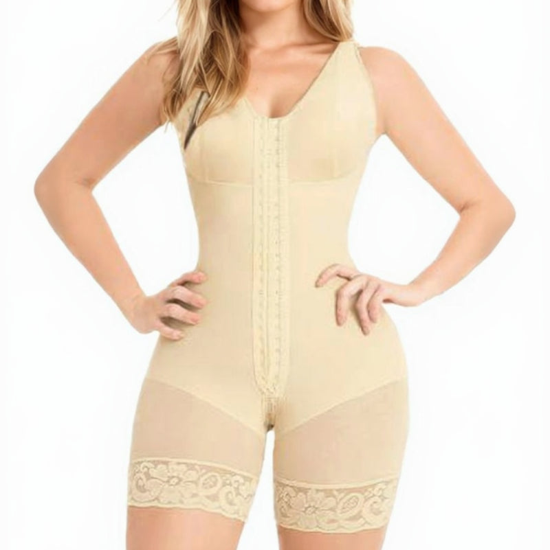 Woman wearing a beige shapewear romper on a white background