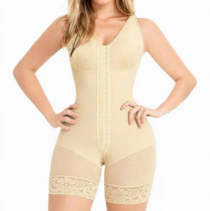 Woman wearing a beige shapewear romper on a white background