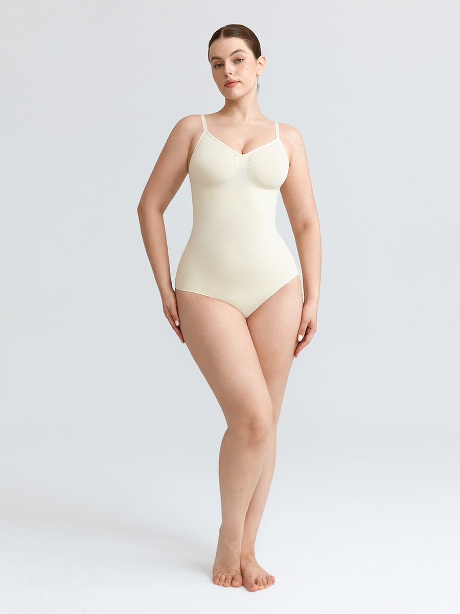 Naadloze V-hals body met geplooid borstgedeelte, buikcorrectie en string-model
