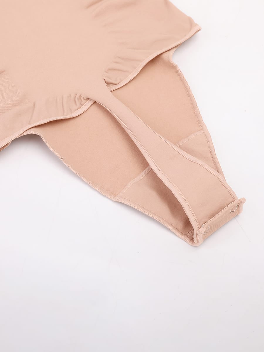 Naadloze V-hals body met geplooid borstgedeelte, buikcorrectie en string-model