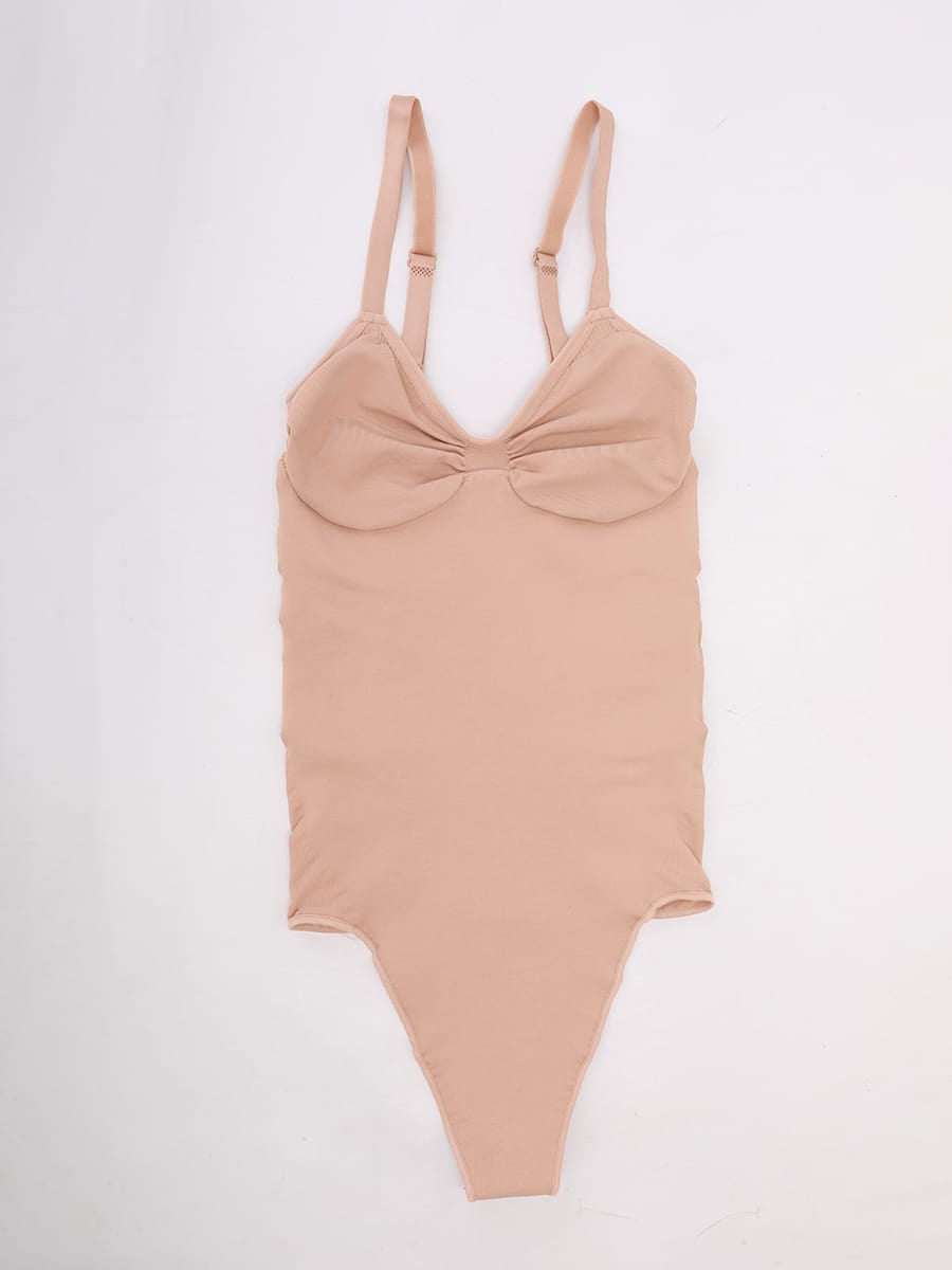 Naadloze V-hals body met geplooid borstgedeelte, buikcorrectie en string-model